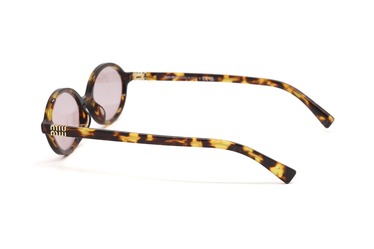 Солнцезащитные очки MU 04ZS 14L4I0 50 Фото №4 - linza.ua