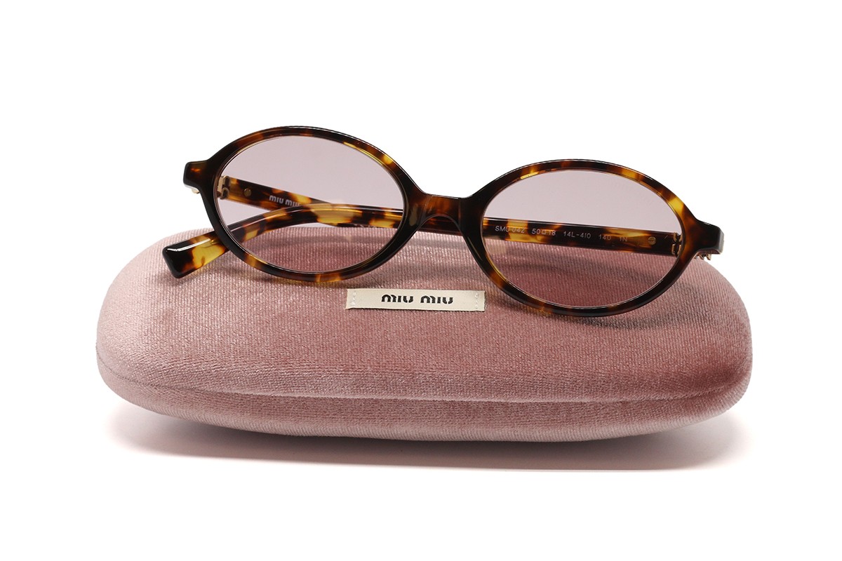 Солнцезащитные очки MU 04ZS 14L4I0 50 Фото №5 - linza.ua